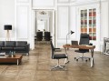 Luksusowy fotel MyTurn 10S w nowoczesnym gabinecie, elegancki design premium i wysoka jakość wykonania.jpg