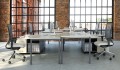 Spójny system biurek Duo-C w biurze typu open-space - ergonomia i profesjonalny design.jpg